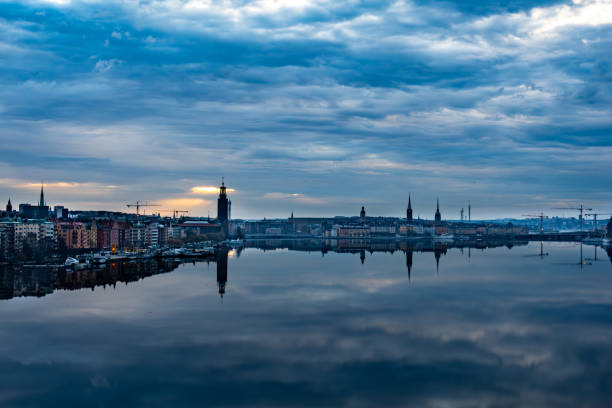 Stockholm, Sweden A view from the Western Bridge towards the City Hall and Gamla Stan and Riddarfjarden in the early morning.