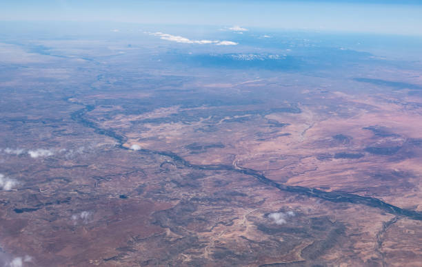 istock Sinuous desert river in the US southwest seen from the air. 2151823055