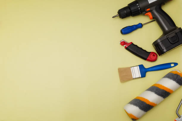 istock Set of tools for builder and electrician on a yellow background. Flat layout. There is space for text 2151832682
