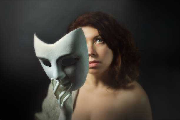 istock Mask of gentleness. Woman confronting internal and societal identity challenges. 2151834047