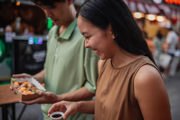 istock Happy couple with sushi to-go 2151834717