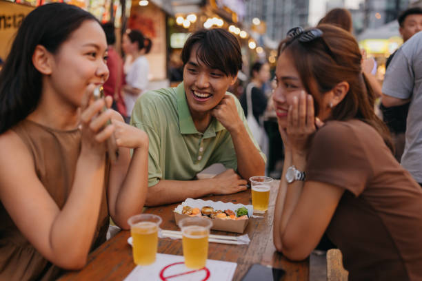 istock Friends at night market 2151834749