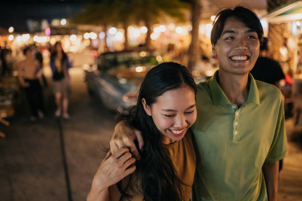 istock Smiling couple in the city 2151835342