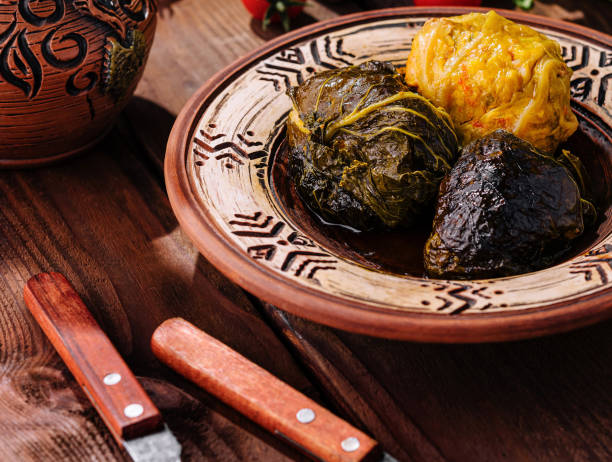 istock Traditional stuffed grape leaves on ceramic plate 2151836370