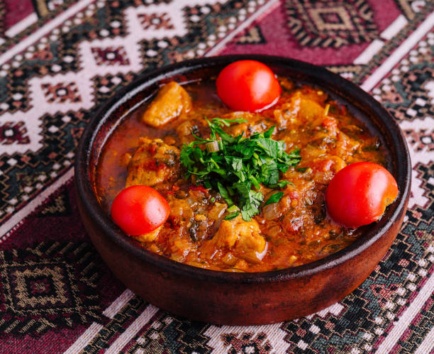 Traditional clay pot stew with fresh herbs