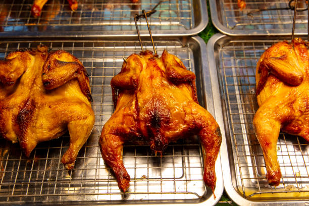 Fried chicken legs on the grill.