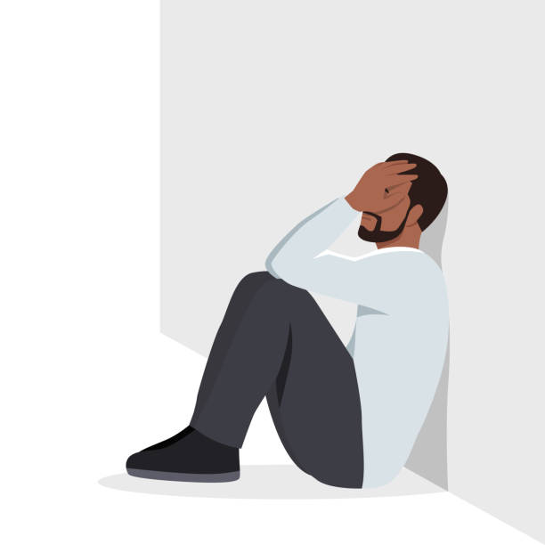 Young black man depressed and sit on the floor. Young black man depressed and sit on the floor. Flat vector illustration isolated on white background legs against the wall stock illustrations