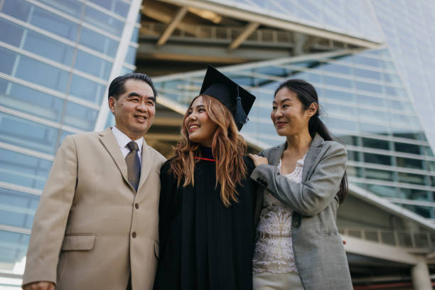 istock Proud parents with a graduated daughter 2151842253