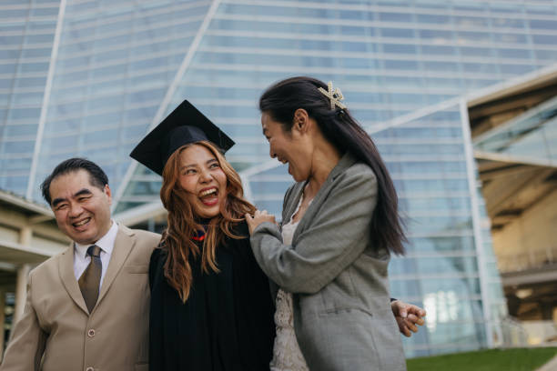 istock Proud parents with a graduated daughter 2151842262