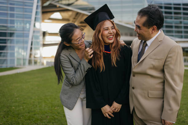 istock Proud parents with a graduated daughter 2151842278