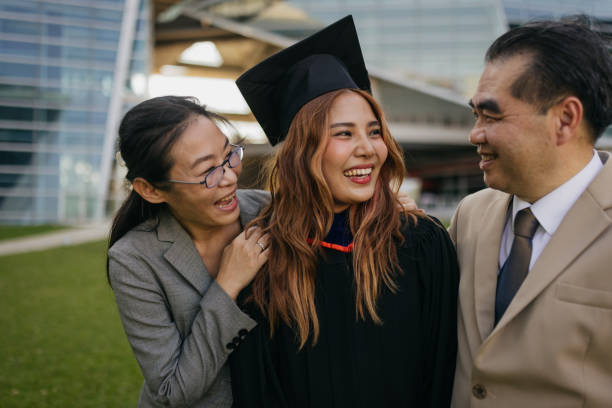 istock Proud parents with a graduated daughter 2151842295