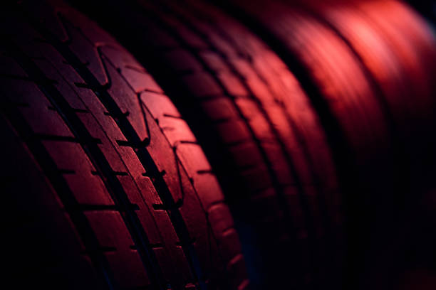 istock Summer car tires background with red light 2151845743