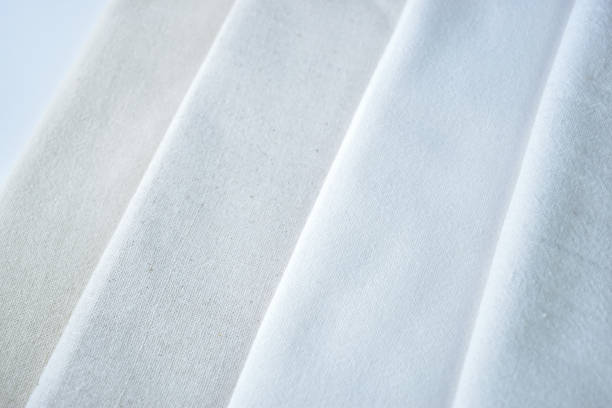 istock stack of white cotton clothes, textile fashion industry 2151847914