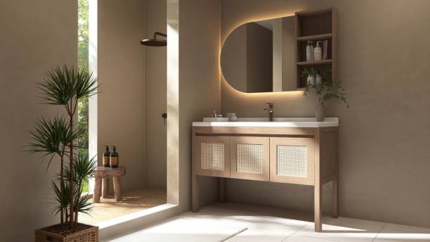 istock Luxury brown bathroom with shower enclosure, partition to vanity counter in sunlight from window on wall 2151848279