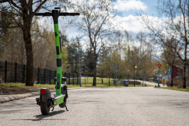 istock rental electric scooter parked on sidewalk 2151849871