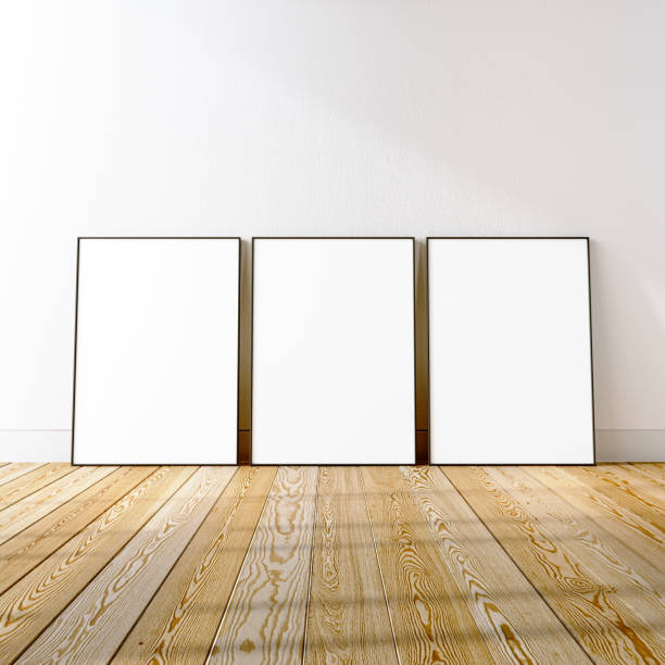 istock 3 frame mockup scene on white wall and hardwood floor, 3d rendering. 2151851034