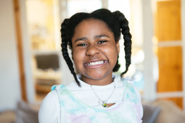 istock Ten year old black girl at home 2151852421
