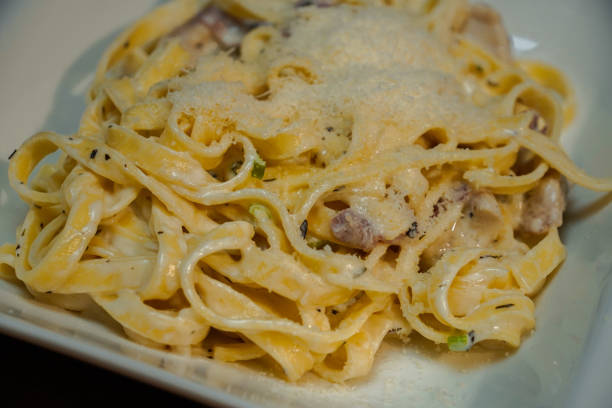 istock Tagliatelle with ham and parmesan cheese 2151853078