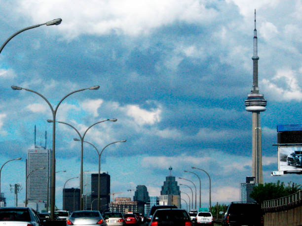 Toronto,Canada - May 19, 2014: General view of China Town with the CN Tower in the image. Chinatown a tourist attraction and busy markets in Ontario. China town is one of the largest in North America