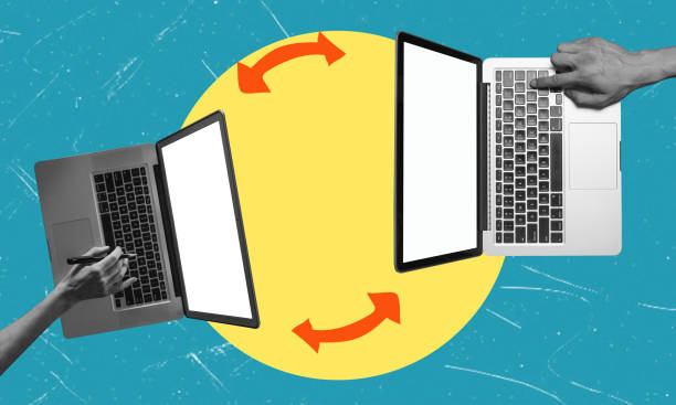 istock Contemporary art collage of two laptops, sharing data over the internet. 2151857026