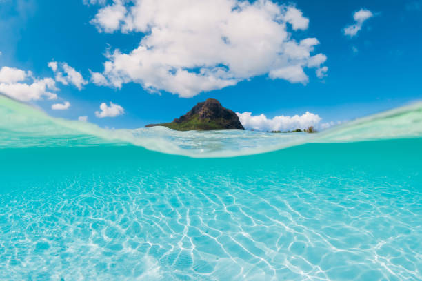 istock Tropical turquoise sea and Le Morne mountain in Mauritius. Split view 2151858716