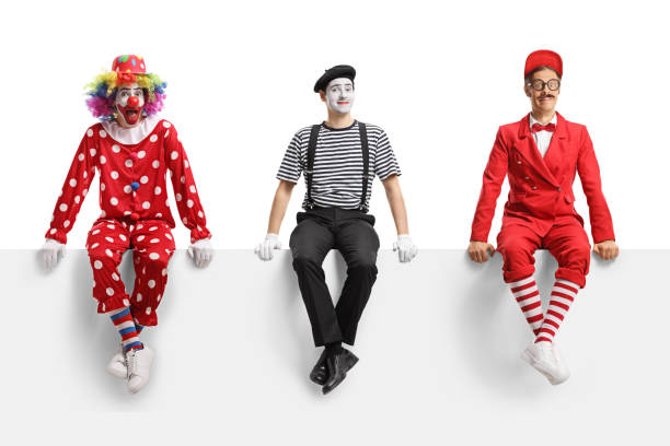 istock Clown, mime and an entertainer sitting on a blank panel 2151859021