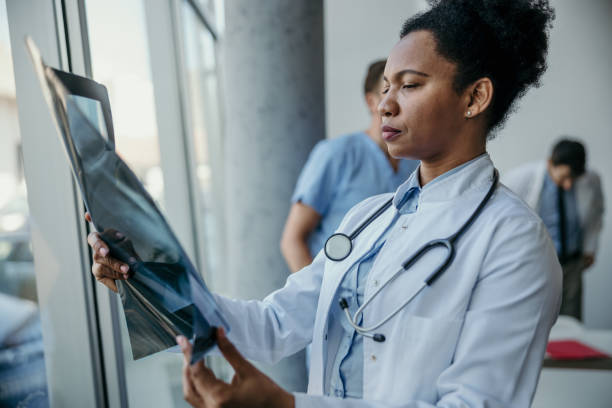 Doctor analyzing a medical x-ray film