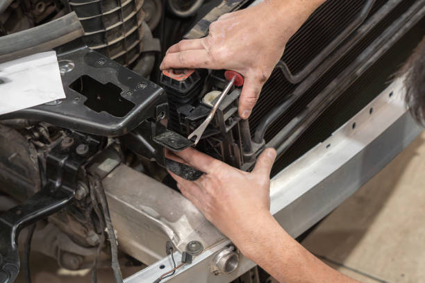 istock Close-up of Mechanic Working on Radiator Installation 2151863020