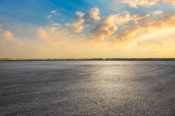 istock Asphalt road square with sky clouds background at dusk 2151867911
