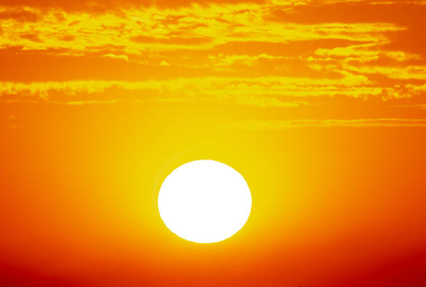 istock Golden sunset on the sky with clouds 2151868331