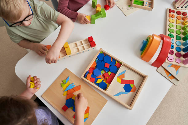 Top view of children having sensory exercises