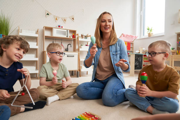 istock Children having music classes with music instruments 2151871899