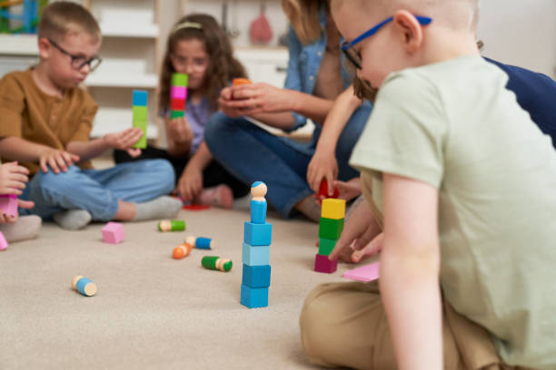 istock Children using toy block for sensory exercises 2151871962