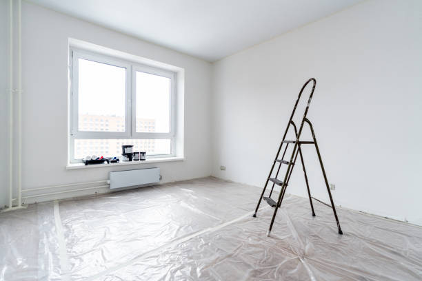 istock An empty room prepared for painting, the floor is covered with polythene 2151872053