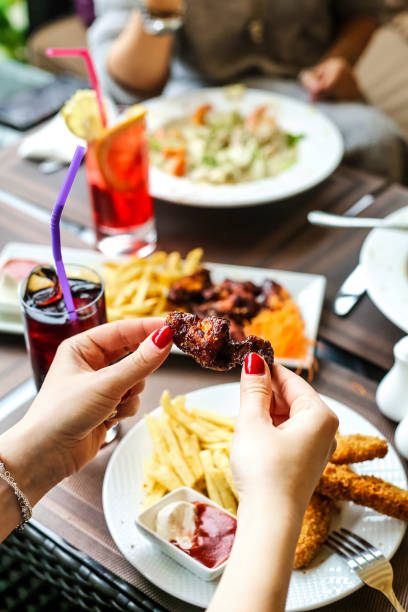 istock Woman Enjoying a Meal at a Table 2151872961