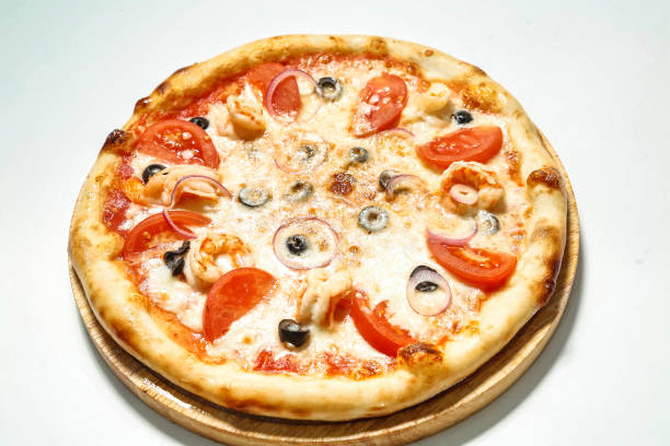 istock Delicious Pizza on Wooden Plate 2151876213
