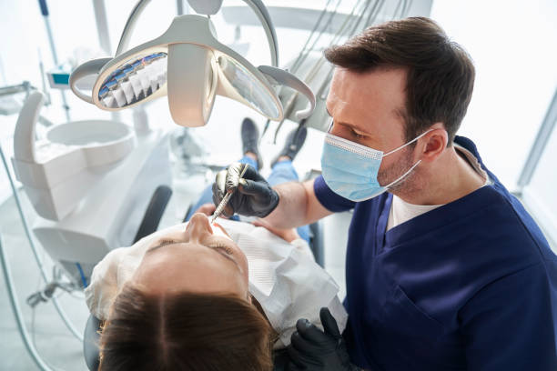 istock Woman having visit at the dentist 2151876252