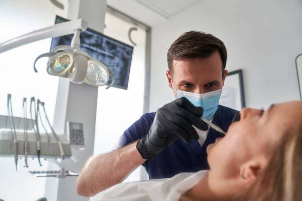 istock Woman having visit at dentist 2151876260