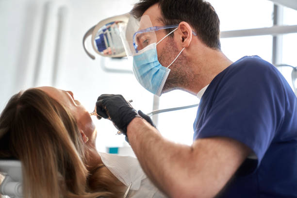 istock Dentist drilling in teeth of the patient 2151876321