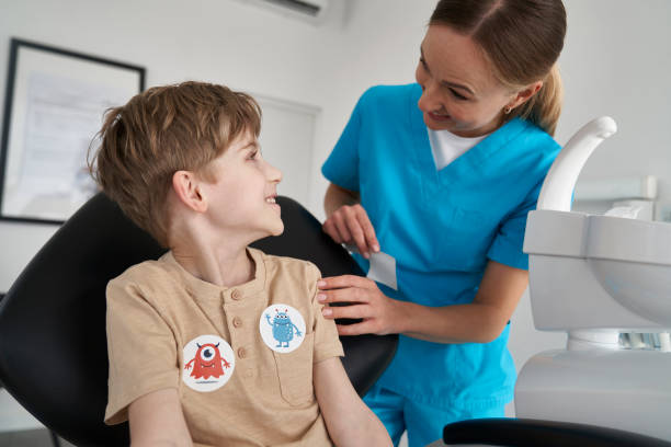 Little boy having stickers after the dentist's appointment