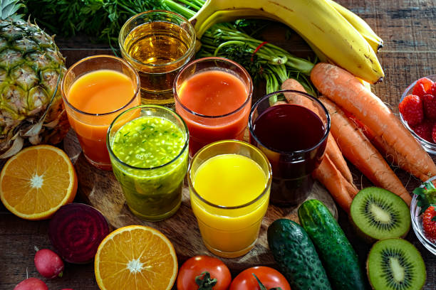 istock Glasses with fresh organic vegetable and fruit juices 2151877389