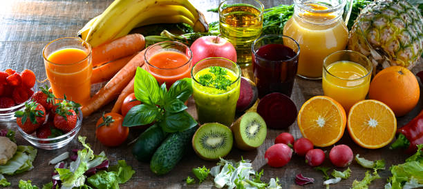 istock Glasses with fresh organic vegetable and fruit juices 2151877462