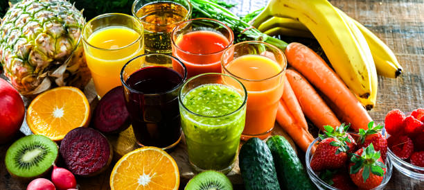 istock Glasses with fresh organic vegetable and fruit juices 2151877521