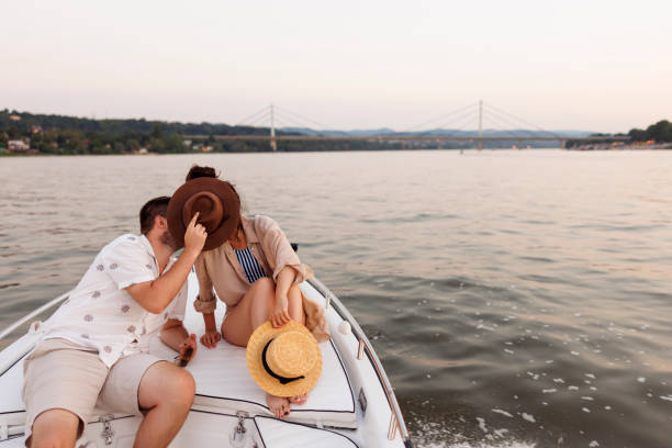 istock Couple kissing while sailing on a boat 2151879947