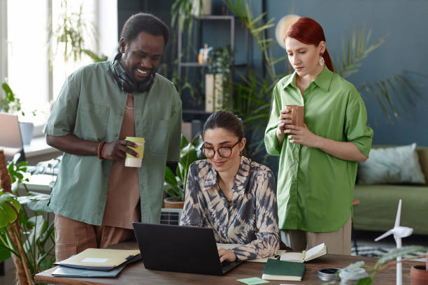 istock Diverse Business Team Using Laptop in Green Office 2151881258