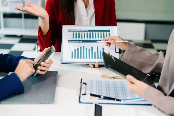 when it comes to probate in texas, many people immediately think of family homes, vehicles, and bank accounts, businessman and team analyzing financial statement finance task with smart phone and laptop