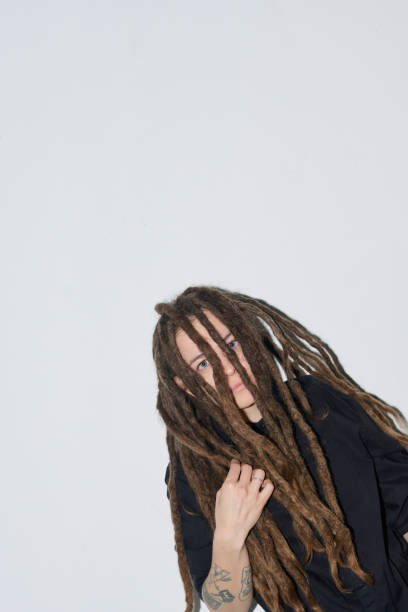 istock At Angle Woman with Long Dreadlocks on White with Flash 2151883967