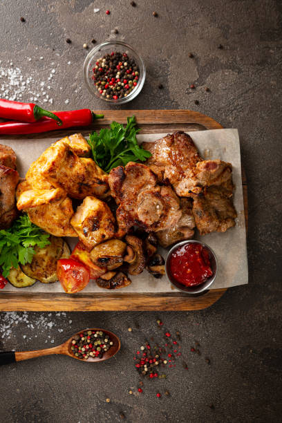 istock top view grilled meat of different types beef pork dark surface 2151884163