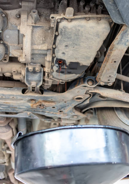 istock Draining oil from a car's variator 2151885783
