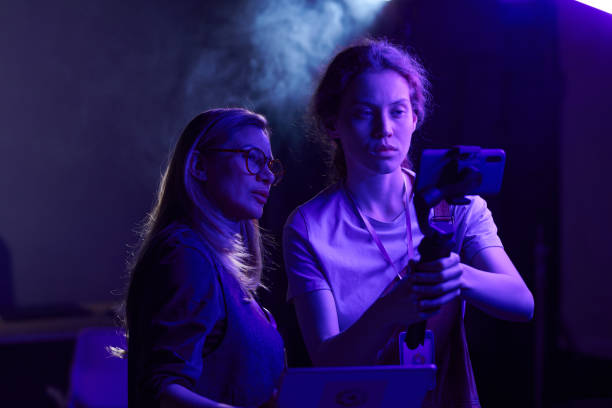 istock Video production crew in neon light 2151886053